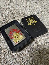 Star Flip-Top Collectible Lighter Silver w/ Red Flames Gold Skull Emblem picture