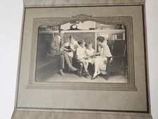 VINTAGE FAMILY PHOTO OF PARENTS READING WITH OR TEACHING THEIR CHILDREN MATTED picture