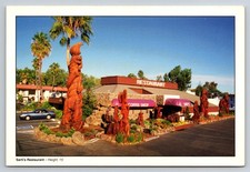 Vintage Sarti's Restaurant Sacramento CA Redwood Sculptures Postcard picture