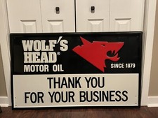 Vintage WOLF’S HEAD Motor Oil Embossed Sign Dated 1989 47x28 Inches picture