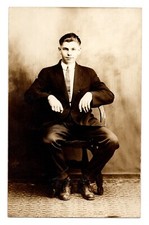 Antique RPPC Postcard Handsome Young Man Suit Seated Chair 1910s picture