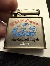 Vintage 1950s Ibelo Monopol 633rd AC&W Squadron Wheelus Field Libya Lighter picture