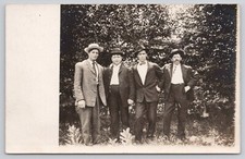 Unidentified Group of Four Men in Suits Wearing Hats c1909-1911 RPPC Postcard picture