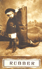 1910 BIG RUBBER BOOT WITH CHILD POSTED POSTCARD DIVIDED MAYBE ADVERTISING? picture