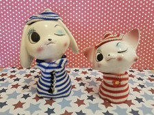 vintage kitsch ceramic dog figurines with big winking eyes picture