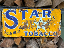 This is an absolutely unique, antique 1920s-1930s Star Tobacco advertising sign picture