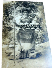 VINTAGE POSTCARD PHILIPPINES NATIVE MAN WITH HUNTER SKULLS picture