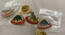 Vintage 1987 Dinosaucer Lapel Pin. Coca Cola Telecommunications 1987 Printed on picture