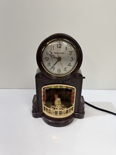 Mastercrafters 335 Swinging Bird Clock Brown Bakelite Swirl New Cord Works Video picture