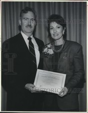 1990 Press Photo University of Louisiana Chancellor Congratulates Jean Cranmer picture