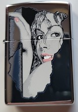 Zippo 20713 Seductive Stare High Polish New in Original case Retired 2005 picture