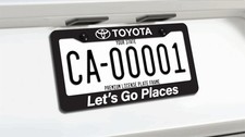 Toyota Place Let's Go Places Dealership License Plate Frame Metal picture