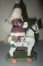 House Hatten Christmas Messengers Rawson Santa Riding COW on Wheels Ornament picture