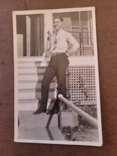 Vtg Black & White Postcard of Young Handsome Man By Porch  Unposted picture