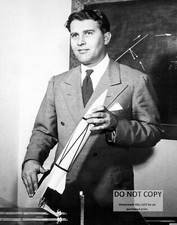DR. WERNHER VON BRAUN HOLDS A MODEL OF THE V-2 ROCKET - 8X10 NASA PHOTO (EP-049) picture