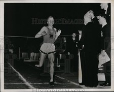 1937 Press Photo Victor Palmason breaks record in half mile race - nes32934 picture