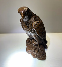 Eagle or Hawk Bird of Prey Figurine Sculpture on Rock Base in Brown picture