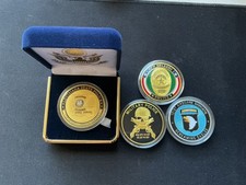 Custom bundle of four challenge coins picture