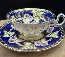 Grosvenor Bone China Cobalt Blue Gold Floral Footed Teacup Saucer England picture