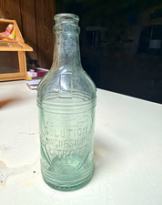 Vintage Aqua Green Solution Magnesium Citrate U.S.P. Embossed Glass Bottle picture