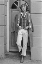 Male model wearing white trousers and a long tweed coat UK 1970s OLD PHOTO picture
