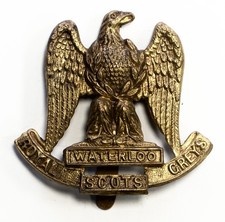 Royal Scots Economy Cap badge with slider picture