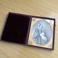 An antique leather cased photograph of a Victorian lady picture