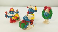 VINTAGE SMURFS 4 CHRISTMAS ORNAMENTS 1981 SCHLEICH - WREATH, TREE, GIFT, SINGING picture
