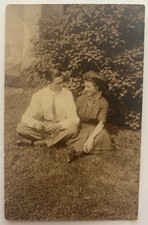 Antique RPPC Young Couple Sitting on Grass Outdoor Portrait 1911 Photo Postcard picture