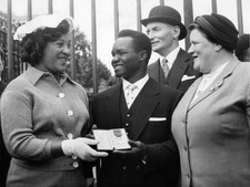 Nigerian boxer Hogan Kid Bassey MBE outside Buckingham Palace with- 1958 Photo picture