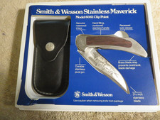 Vintage  S&W maverick # 6061  Deer Scene folding knife. Ex. in orig. box . 1980s picture