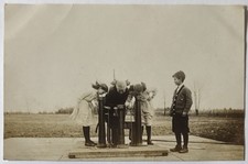 Children Boy Watching Girls Drink From Water Fountain Antique RPPC Postcard picture