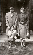 Family Portrait 1940s-1950s Outdoor Home Scene with Teddy Bear Photograph picture