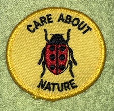 Vtg Care About Nature Girl Scout Round Patch - Yellow With Ladybug picture