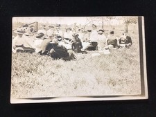ORIGINAL EARLY 1900s RPPC PHOTO ~ YOUNG ADULTS ENJOYING A PICNIC, FANCY HATS picture