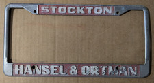 VTG Metal Stockton CA Hansel & Ortman Cadillac Olds Dealer License Plate Frame picture