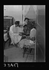 Photo:1930s 1940s African American Women Sewing in Bedroom Interior picture