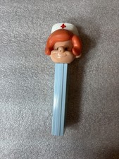Vintage PEZ Nurse No Feet Dispenser - Austria 2.6 Patent - Blue Stem Orange Hair picture