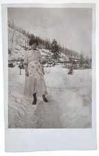 Kalispell Montana | RPPC Postcard Woman in Snow Logging Timber | Hileman picture