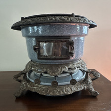 3 burner cast iron / porcelain enameled cook stove. Sizes shown in pictures. picture