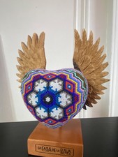 La Casa de la Playa Beaded Heart with Wings Huichol Wooden Stand picture