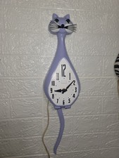 Rare 50s/60s Spartus Here Kitty Purple Inviolet Kitty clock.  Working tail/eyes. picture
