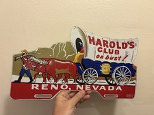 Vintage 1950s Harold's Club Or Bust Reno Nevada License Plate Topper Metal Sign picture