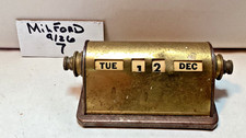 Antique brass perpetual desk calendar picture