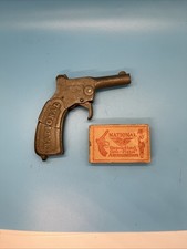 Vintage National Cast Iron Cap Gun Pistol With National Box of Caps picture