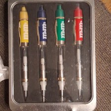 M&M's Collectible 4-Pen Set in Tin Case, Yellow Blue Green Red Plastic Light Up picture