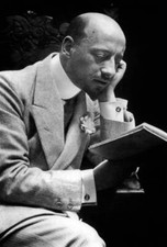 Italian writer and nationalist Gabriele d'Annunzio here reading c 1908 Old Photo picture
