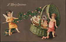 Christmas Cherub Children Basket of Cookies & Candy c1910 Embossed Postcard picture