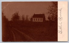 Bethel Church in Russell Iowa, on Hill by Rutted Dirt Road Rural Scene 1908 RPPC picture