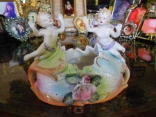 Older Amphora Lady and Angels on Open Flower Centerpiece picture